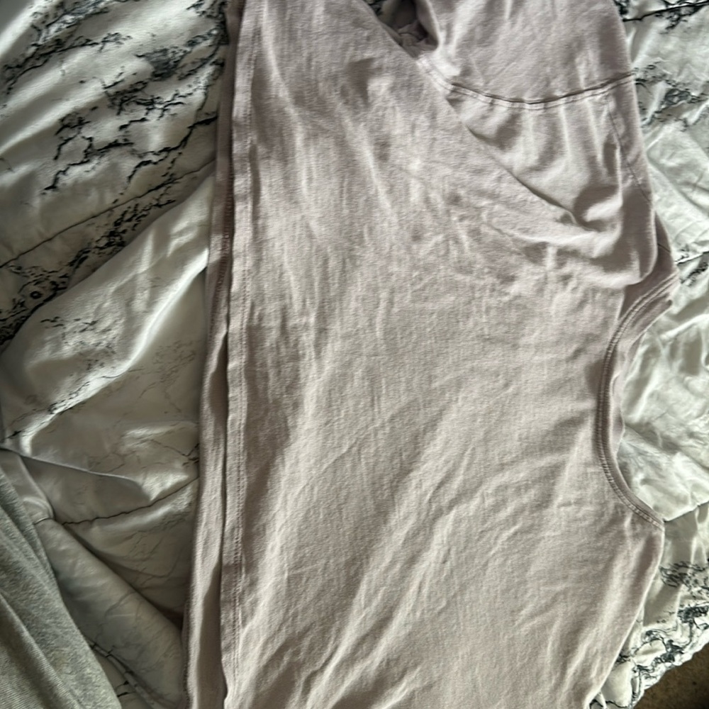 I am selling this kinda cropped oversized shirt in the color light pink